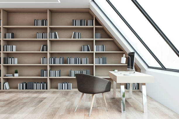 istock Modern office with bookshelf and desk in attic room. 3D Rendering 2167525869