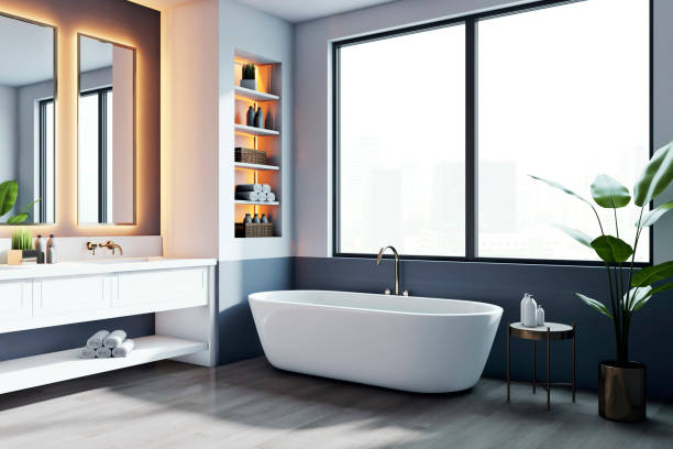 istock Modern bathroom interior with a large window and city view. 3D Rendering 2167526129