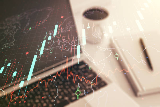 istock Multi exposure of abstract creative financial chart with world map on laptop background, research and analytics concept 2167526835