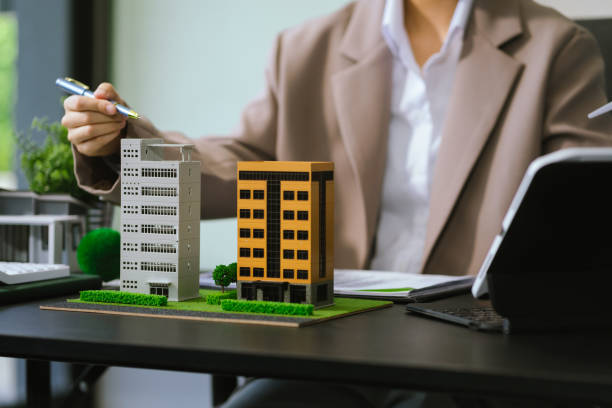 istock Real estate broker agent presenting and consult to customer to decision making. 2167527616
