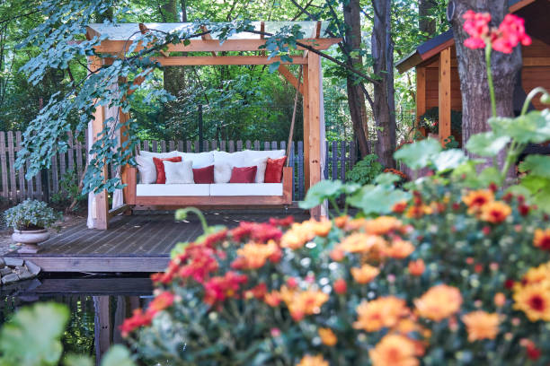 istock veranda with garden swing is decorated with fall decor and chrysanthemums 2167531390