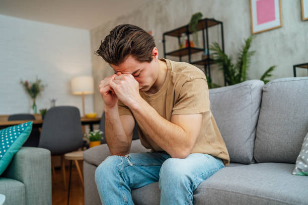istock Young upset man at home 2167531809