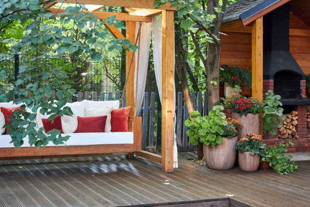 istock veranda with garden swing is decorated with fall decor and chrysanthemums 2167532137