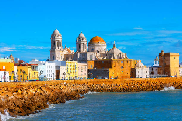 Cadiz city with a large cathedral on the coast