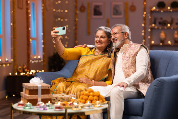 istock Senior couple using phone stock photo 2167537887