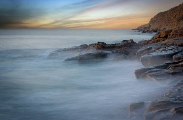 istock stones in sea water 2167543351