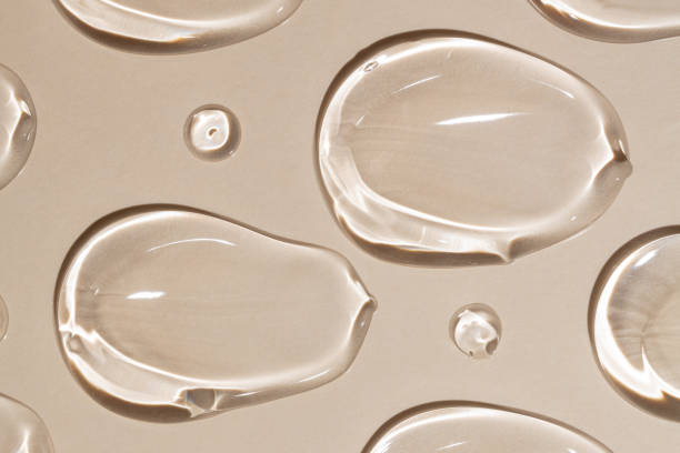 istock High-quality, cosmetic serum swatches pattern reflected off a smooth surface creating a clean and modern aesthetic for beauty concepts. 2167545697