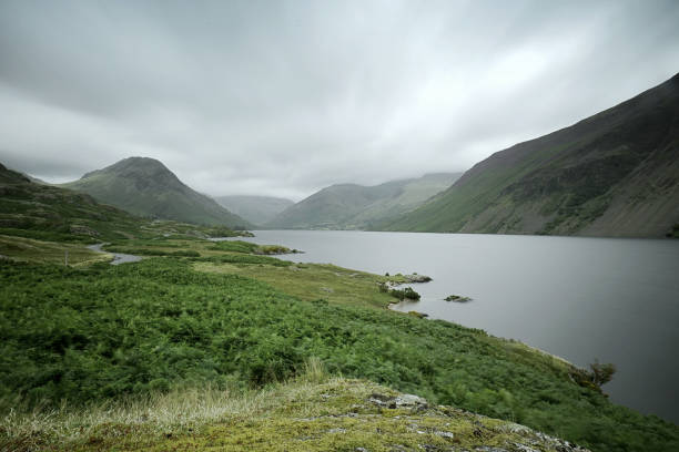 Shore line of Wast Water in the Lake District. A long daytime exposure to blur the sky and smooth the lake.