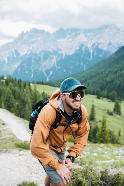 Shot of a happy smiling hiker in the Apls.