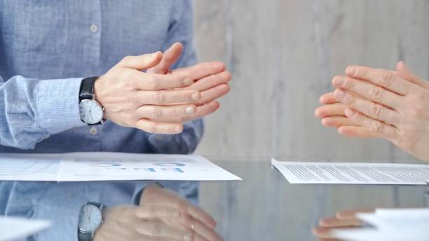 istock Unrecognizable business people clapping over glass table after c 2167550519