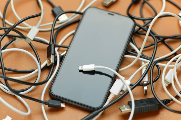 istock A smartphone on the confused charging cables 2167550554
