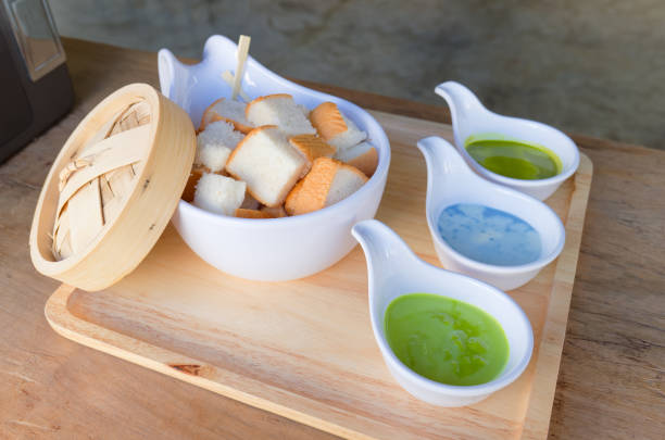 Steamed toast with pandan custard, served in a restaurant, a traditional Thai dessert