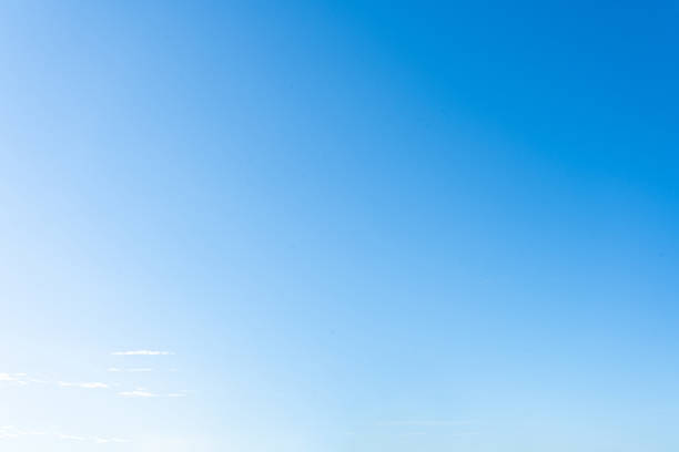 istock Bright and beautiful blue sky with fluffy white clouds 2167550796
