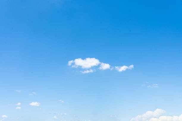 istock A beautiful blue sky filled with fluffy white clouds 2167550831