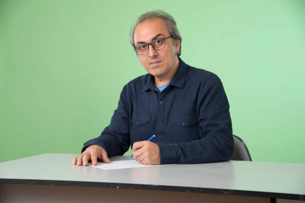 Casual business man sitting at a table