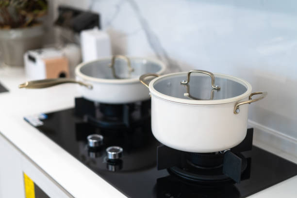 istock steel cooking pan on stove 2167555366