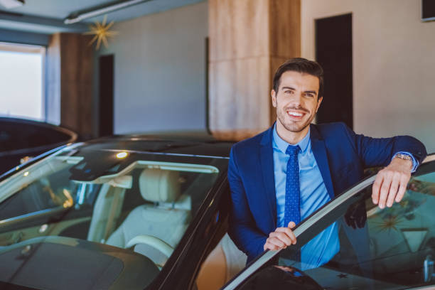 istock Businessman enjoying new car 2167555615