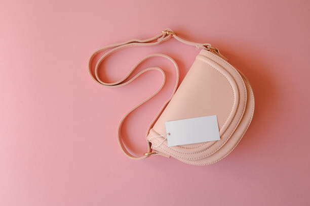 istock Women's pink bag with thick tag, copy space 2167557954