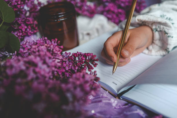 istock Girl writes in a notebook, aesthetics 2167558604