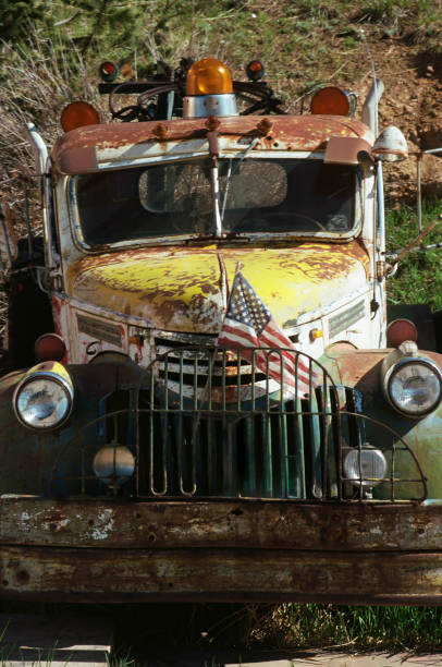 Victor, Colorado,  USA- 07/27/2024: Antique pickup truck parked on display on main street for tourists to view.