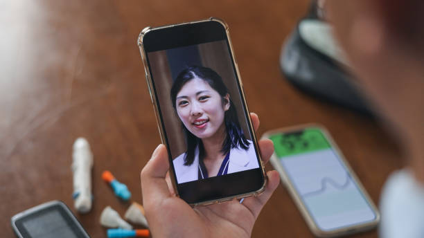 istock Patient Uses Telemedicine By Mobile 2167559863