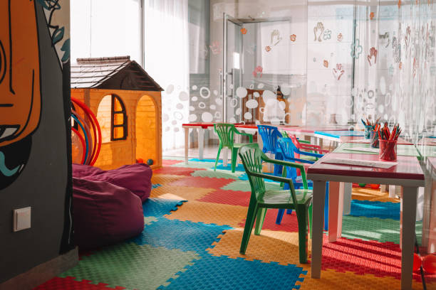 Chairs, table and toys. Interior of kindergarten