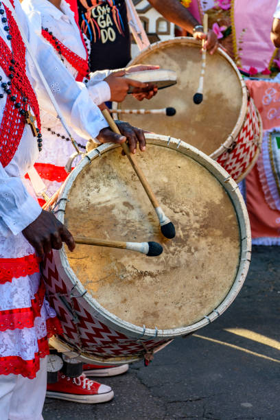 istock Drummers with rustic and colorful wooden drums 2167562230