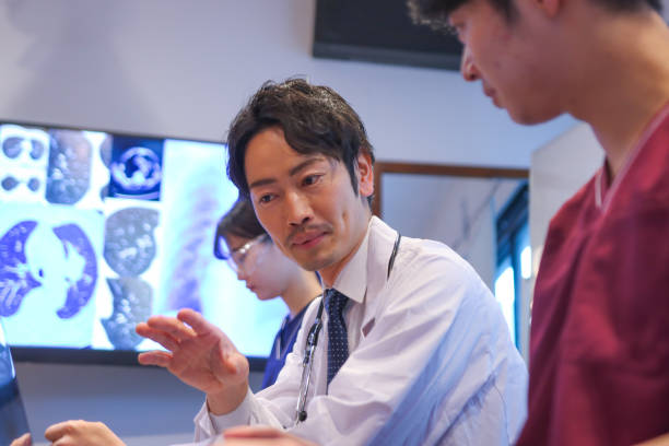 istock Group Of Doctors In A Meeting Room 2167564984