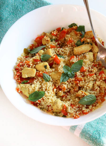 istock Cold chicken couscous with peppers and curry. 2167565836