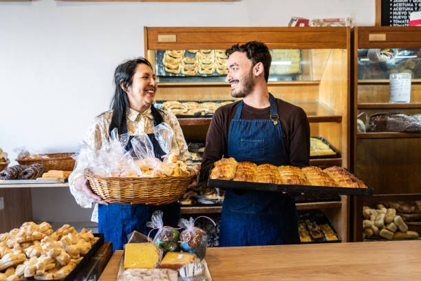 istock Owners holding tray with breads in a bakery 2167569879