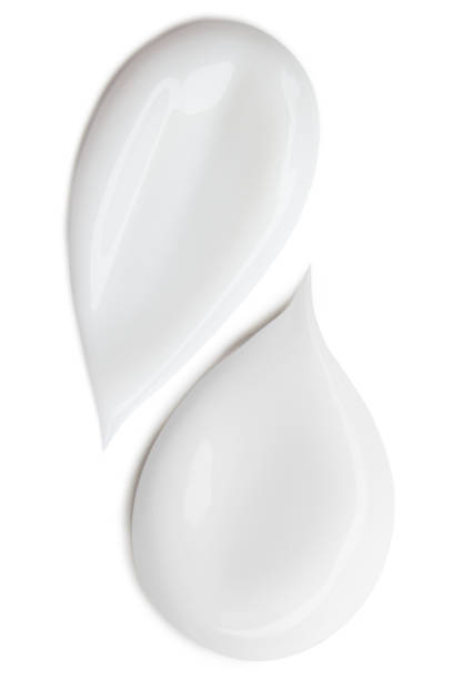istock Smear of white cosmetic cream on empty background. 2167570011