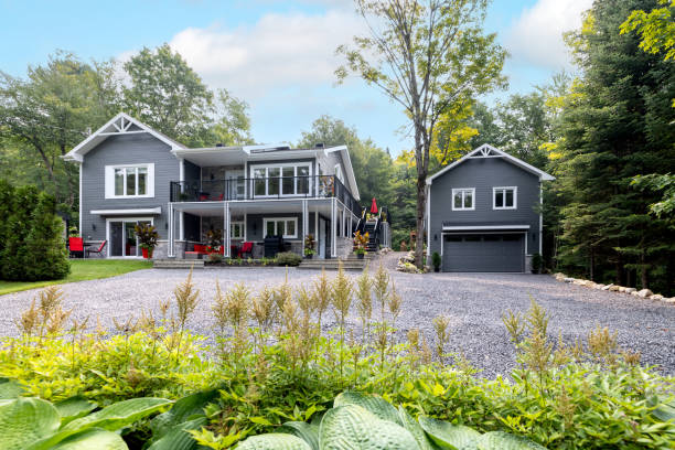 istock Luxurious gray and white property and detached garage 2167571356