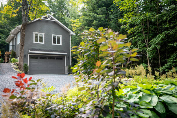istock Luxurious gray and white two-story detached double garage 2167571375