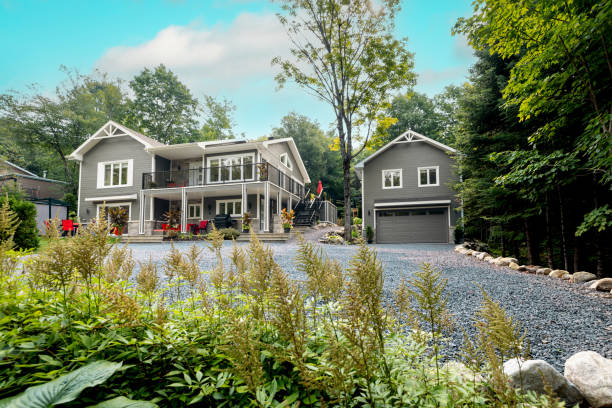 istock Luxurious gray and white property and detached garage 2167571411