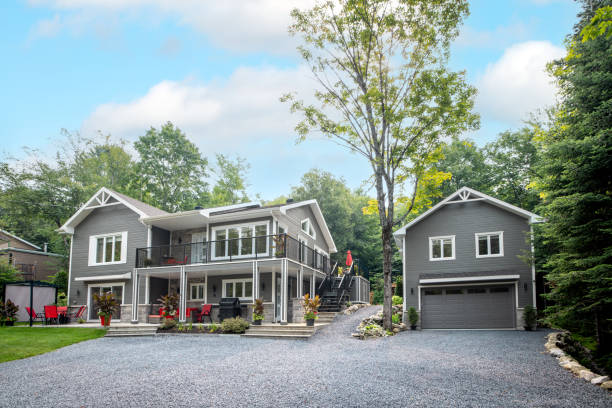 Luxurious gray and white property and detached garage