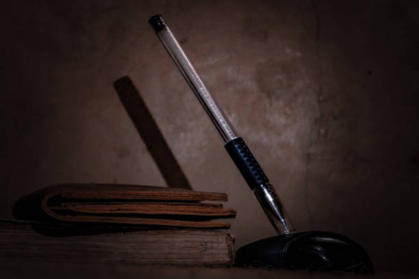 still life of a pen standing on a work desk