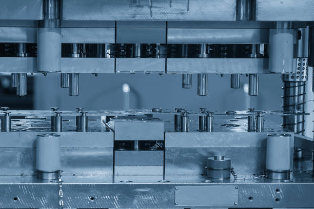 istock The metalworking process by progressive die in the light blue scene. 2167572896