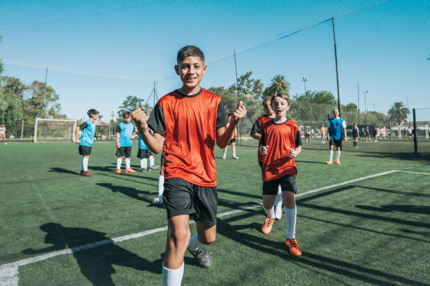 istock soccer boys cheering after scoring a goal 2167573915