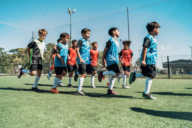 istock warming up for training on soccer field 2167574437