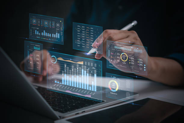 istock Hands working on financial data analysis on a laptop, digital charts and graphs KPI key performance indicators and reports management. financial research. Perfect for fintech, marketing concept. 2167577776