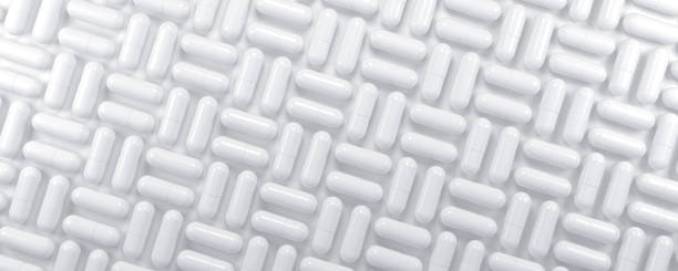 istock Medicines pills capsules geometric pattern background. 3d illustration 2167577977