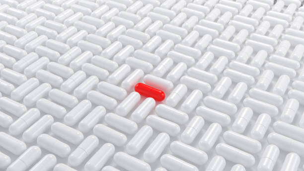 istock Red pill among whites. 3d illustration. 2167578616
