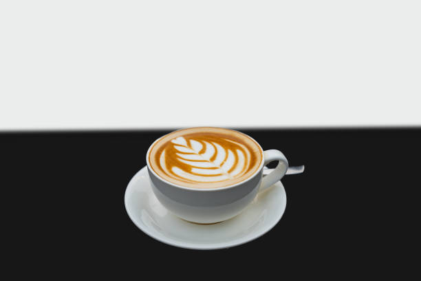 istock Freshly Made cappuccino latte coffee for breakfast with lead decoration pattern isolated 2167582726
