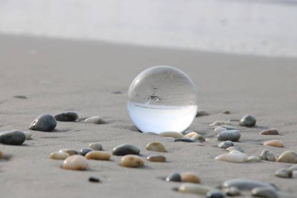 istock Crystal ball reflecting serene landscape and sky 2167583640