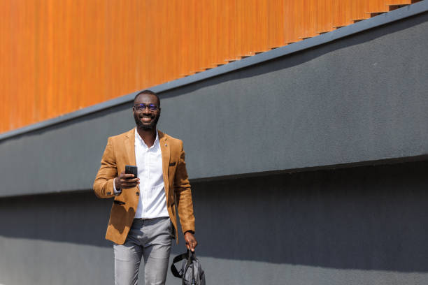 istock Confident African American businessman walking outside 2167583821