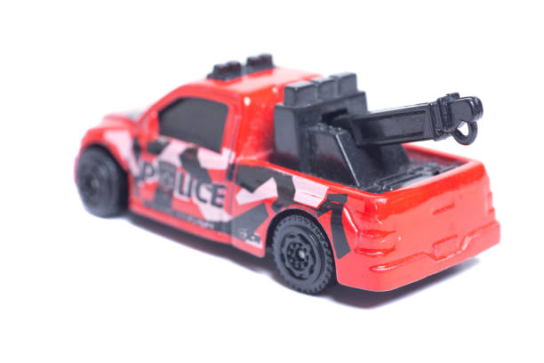 Toy police car on a white background.