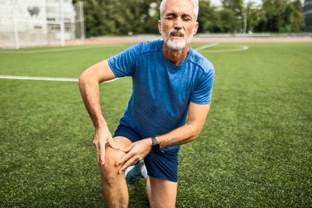 istock Senior man runner with knee pain 2167584746
