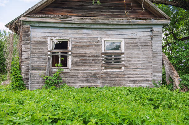 Abandoned farmhouse on the prairies in winter.