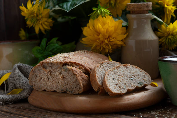 istock Homemade bread on an old wooden table. 2167585867