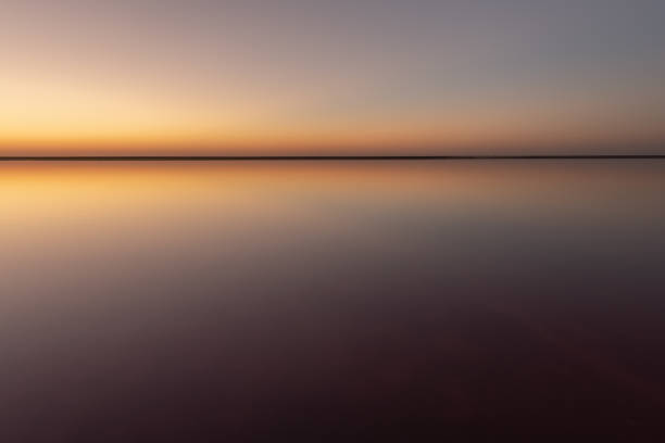 istock Tranquil minimalist landscape with smooth surface of the pink salt lake 2167586838